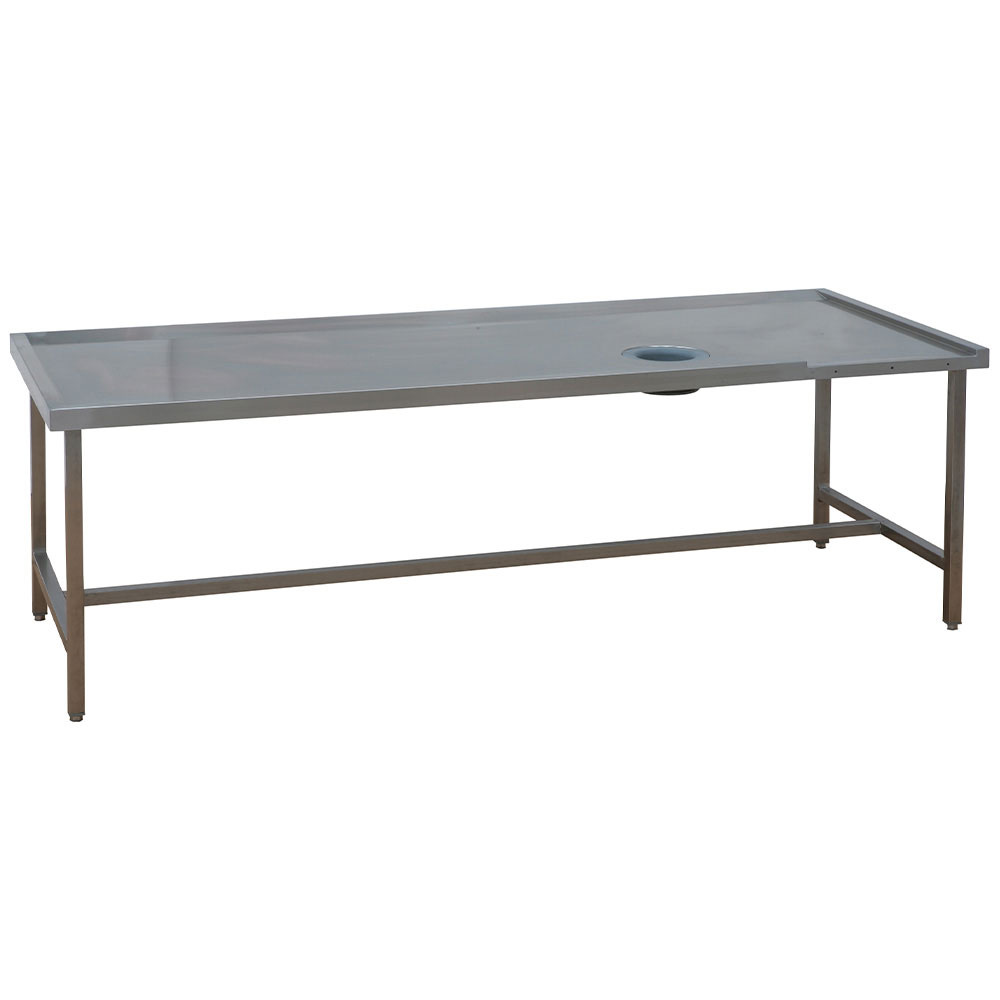 Mesa de clasificación (izquierda) con agujero para la basura